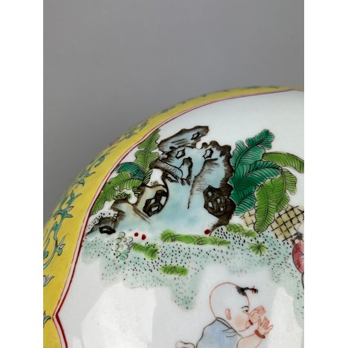 178 - A 20TH CENTURY YELLOW FAMILLE ROSE CHINESE PORCELAIN LIDDED BOWL WITH PAINTED IMAGERY OF CHILDREN PL... 