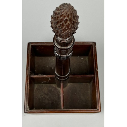 190 - A 19TH CENTURY MAHOGANY BOTTLE HOLDER, for four bottles, with carved fir cone handle.