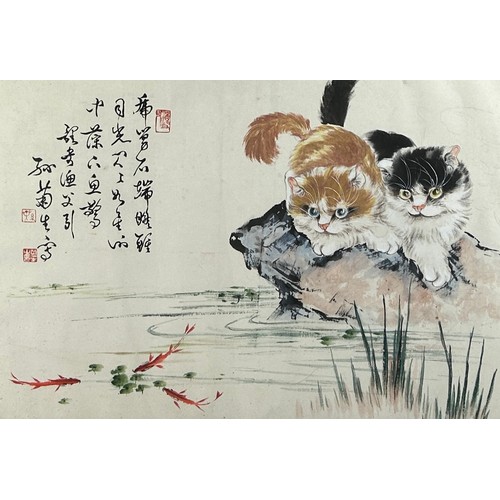 87 - A CHINESE INK AND WATERCOLOUR PAINTING OF TWO CATS WATCHING GOLDFISH, with calligraphy and three red...