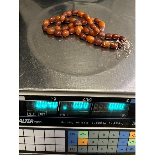 26 - A LARGE BALTIC AMBER BUTTERSCOTCH NECKLACE ALONG WITH A SMALLER EXAMPLE

Some parts loose on large. ... 