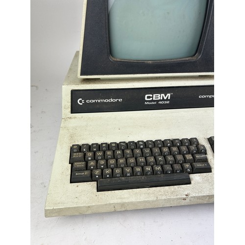 214 - A COMMODORE PET COMPUTER MODEL 4032, with plug. 

Untested, for parts.

**Please note this lot will ... 