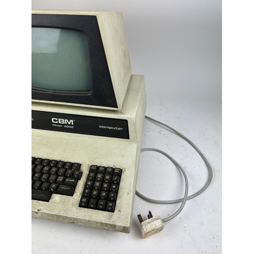 214 - A COMMODORE PET COMPUTER MODEL 4032, with plug. 

Untested, for parts.

**Please note this lot will ... 