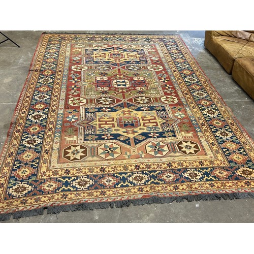 199 - A VERY LARGE KILIM RUG,

375cm x 275cm

**Please note this lot will be available for collection at a... 