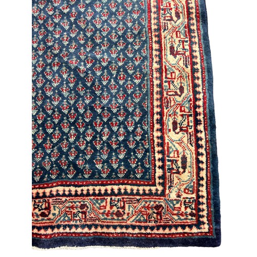 200 - A LARGE PERSIAN RUNNER CARPET