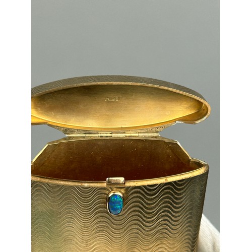 5 - PROPERTY OF A TITLED LADY: A LARGE 9CT GOLD OVAL SHAPED CIGARETTE CASE, with opal push piece and eng... 