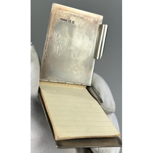 15 - PROPERTY OF A TITLED LADY: AN ASPREY AND CO LONDON SILVER NOTEBOOK, 

Engraved with imagery of Westm... 