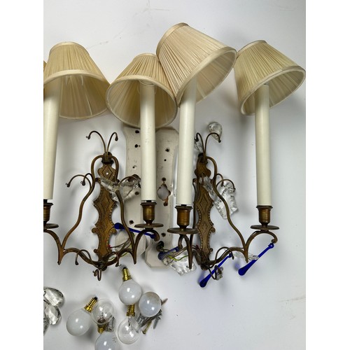 197 - A SET OF FOUR WALL SCONCES, brass with crystal and blue glass drops (4)