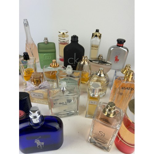 165 - A COLLECTION OF PARTIALLY USED DESIGNER PERFUME BOTTLES, to include Yves Saint Laurent, All Saints, ... 