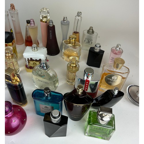 177 - A COLLECTION OF PARTIALLY USED DESIGNER PERFUME BOTTLES, to include Lacoste, Calvin Klein and more (... 