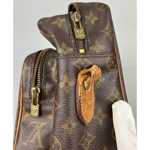 36 - A LOUIS VUITTON CROSSBODY BAG AND A BURBERRY HANDBAG

Both straps broken off the bag, zips working f... 