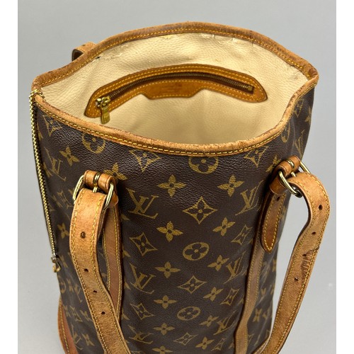 26 - A LOUIS VUITTON BUCKET BAG, brown and tan leather with two buckled straps and LV monogram throughout... 