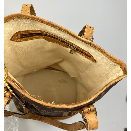 26 - A LOUIS VUITTON BUCKET BAG, brown and tan leather with two buckled straps and LV monogram throughout... 