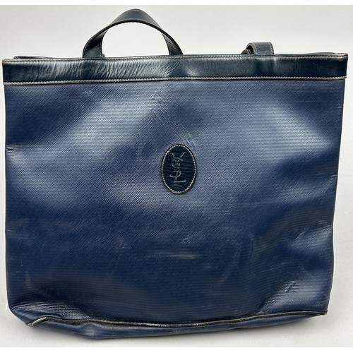 29 - A VINTAGE YVES SAINT LAURENT TOTE BAG, royal blue with central 'YSL' emblem and blue leather straps
... 