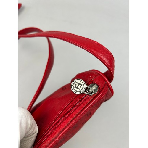 13 - A VINTAGE FENDI SIDE BAG IN BLOOD RED, interlocking 'FF' emblems throughout and red leather straps. ... 