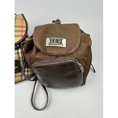 47 - A BURBERRY'S LARGE RUCKSACK BACKPACK AND AN ICEBERG JEANS BROWN NYLON RUCKSACK, 

The Burberry's wit... 