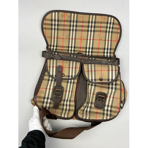 47 - A BURBERRY'S LARGE RUCKSACK BACKPACK AND AN ICEBERG JEANS BROWN NYLON RUCKSACK, 

The Burberry's wit... 