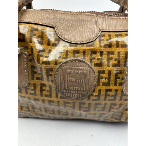 51 - A VINTAGE FENDI 'TOFFEE WRAPPER' DUFFELL BAG HOLDALL, with 'Zucca print' interlocking 'FF' emblems t... 