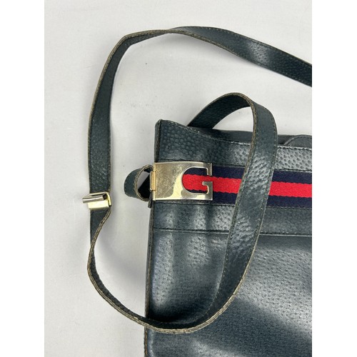 15 - A VINTAGE GUCCI SIDE BAG, blue leather with red and blue belt logo and gold coloured hardware

27cm ... 