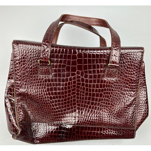 27 - A VINTAGE VALENTINO CROCODILE SKIN MAROON HANDBAG, 

35cm x 30cm

Very good condition, minimal signs... 