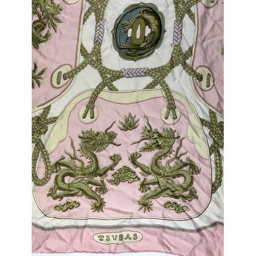 126 - A LARGE VINTAGE HERMES PARIS SILK SCARF, in white gold and pink depicting dragons and gold chains

8... 