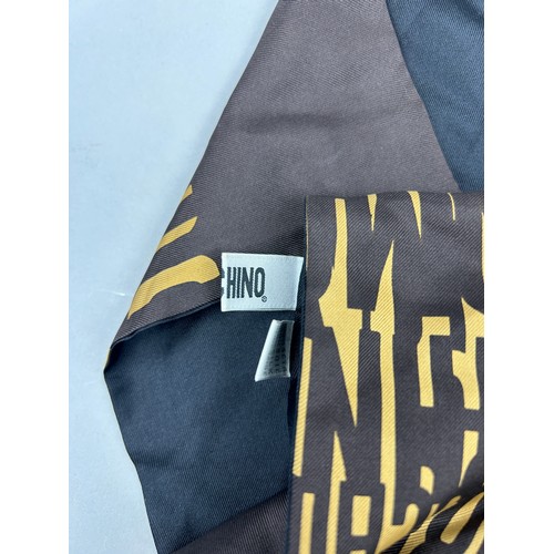 120 - A VINTAGE MOSCHINO SILK SCARF IN BLACK AND YELLOW WITH MONOGRAM PRINT THROUGHOUT,

150cm in length 
... 