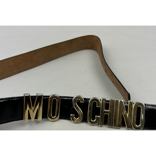 99 - A VINTAGE MOSCHINO BELT IN BLACK WITH GOLD 'SPELL-OUT' LOGO,

90cm in length