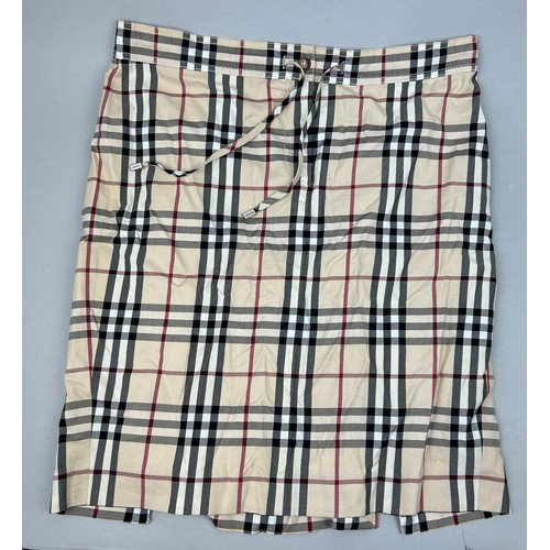 107 - A VINTAGE BURBERRY SKIRT WITH NOVA CHECK PRINT THROUGHOUT,

UK Size 14