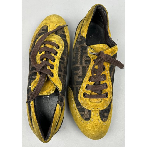 105 - A PAIR OF FENDI TRAINERS, brown interlocking F logo'ing with yellow suede details and brown laces.