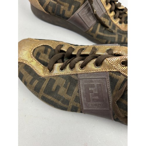 104 - A PAIR OF FENDI TRAINERS, brown interlocking 'FF' throughout with shiny gold metallic detailing and ... 