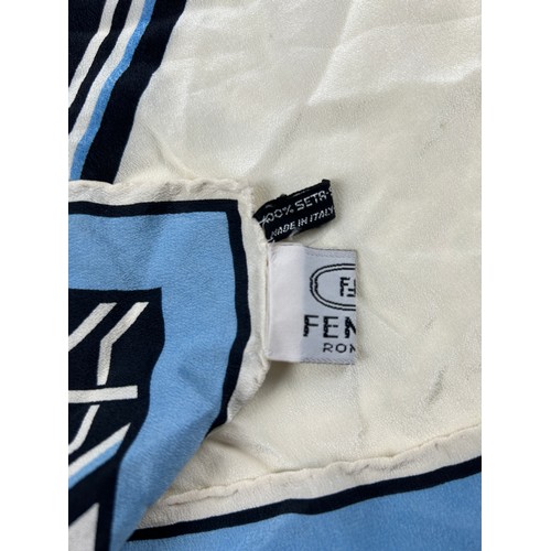 127 - A VINTAGE FENDI SILK SCARF, blue, cream and black,

75cm x 75cm 

Good condition, light marks.