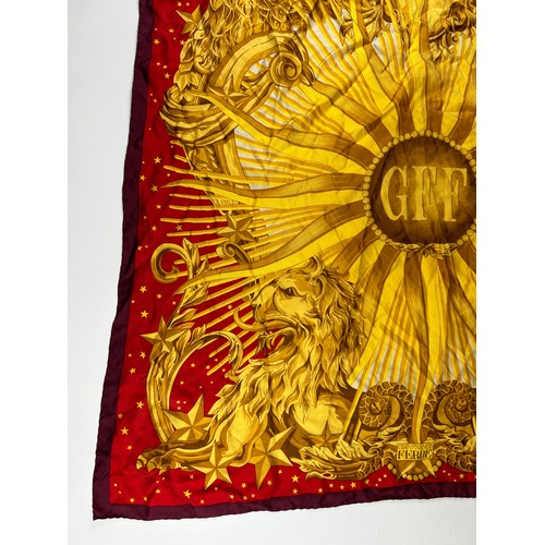 128 - A VINTAGE GIANFRANCO FERREGAMO SILK SCARF, red and gold depicting regal lions and eagles

85cm x 85c... 