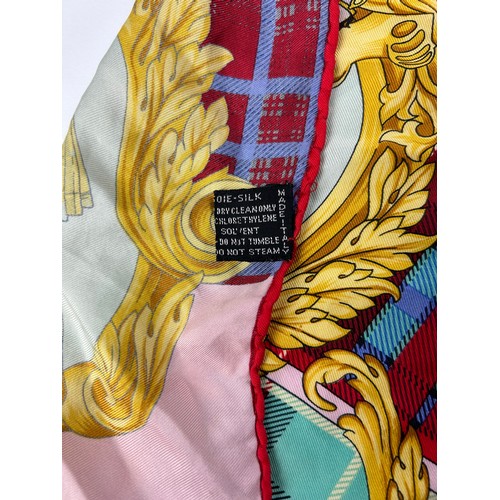 129 - A VINTAGE VERSACE SILK SCARF, plaid and chequered pattern 'The Clans' with royal crests and emblems ... 