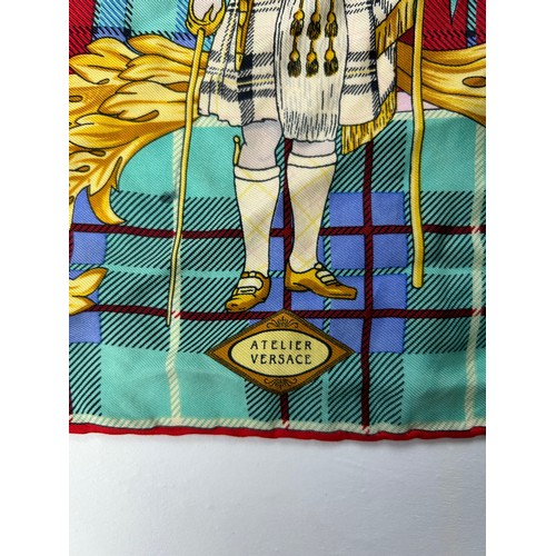 129 - A VINTAGE VERSACE SILK SCARF, plaid and chequered pattern 'The Clans' with royal crests and emblems ... 