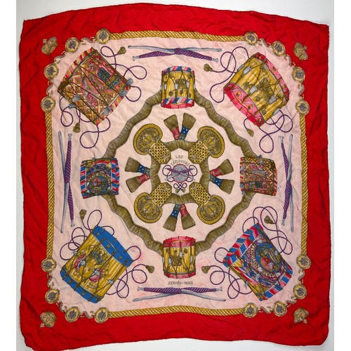 136 - A LARGE VINTAGE HERMES SILK SCARF, red, gold and pink with instrument design throughout

75cm x 75cm... 