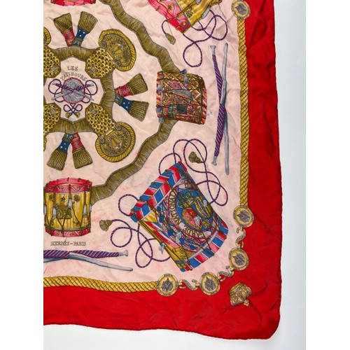 136 - A LARGE VINTAGE HERMES SILK SCARF, red, gold and pink with instrument design throughout

75cm x 75cm... 