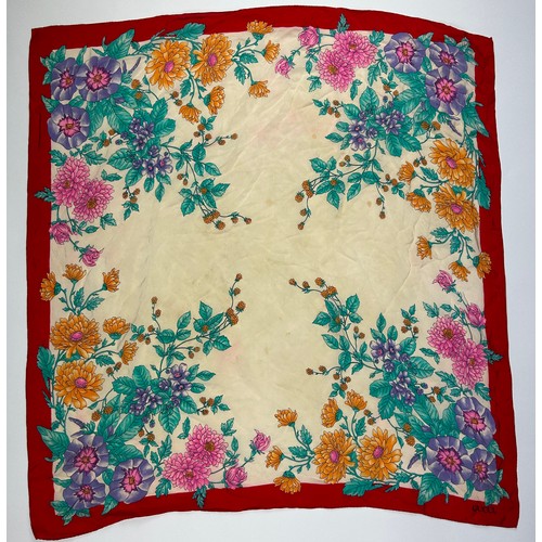 138 - A LARGE VINTAGE GUCCI SILK SCARF, of foliate design with green, orange, pink, purple and beige colou... 