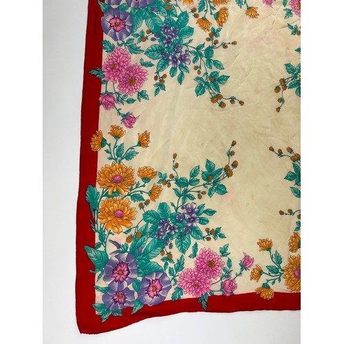 138 - A LARGE VINTAGE GUCCI SILK SCARF, of foliate design with green, orange, pink, purple and beige colou... 