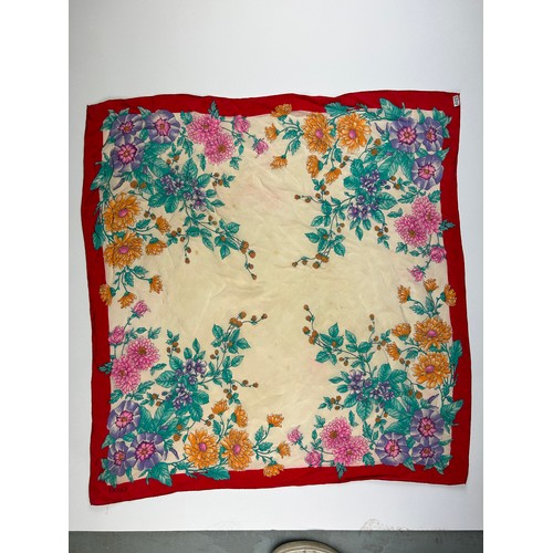 138 - A LARGE VINTAGE GUCCI SILK SCARF, of foliate design with green, orange, pink, purple and beige colou... 