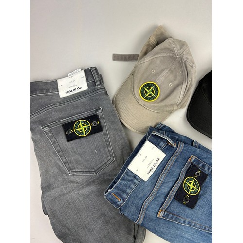 95 - A COLLECTION OF STONE ISLAND CLOTHING, to include two pairs of jeans, two caps and a wool hat (5)