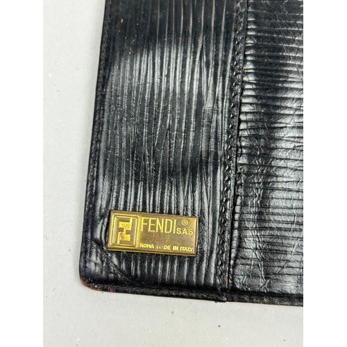 56 - A SELECTION OF THREE VINTAGE FENDI WALLETS, two brown and one black all with interlocking 'FF' monog... 