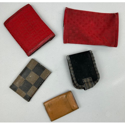 57 - A SELECTION OF FIVE VINTAGE FENDI WALLETS AND ACCESSORIES, to include two red, one brown vanity set,... 