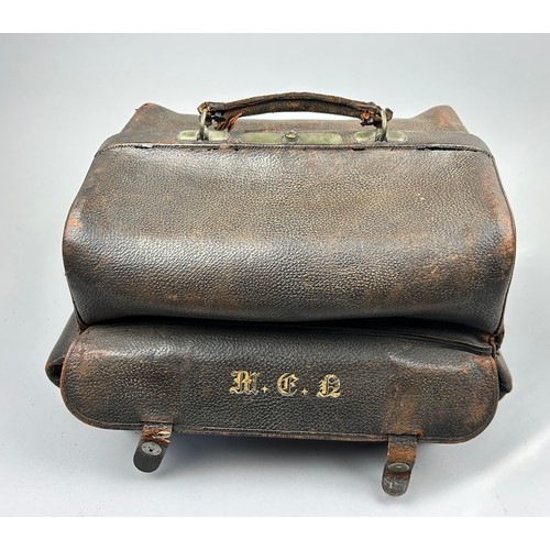 154 - A GENTLEMAN'S VANITY CASE, with silver topped bottles