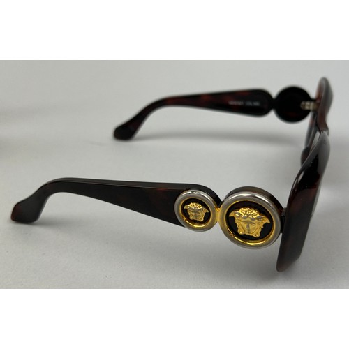 61 - A PAIR OF VERSACE SUNGLASSES IN ORIGINAL CASE WITH TAGS AND CERTIFICATE OF AUTHENTICITY, 

Gold medu... 