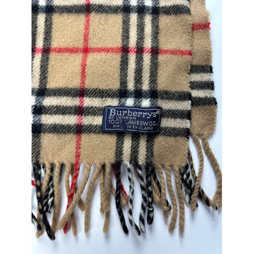 109 - A COLLECTION OF THREE BURBERRY WOOL SCARVES WITH NOVA CHECK PATTERN THROUGHOUT,