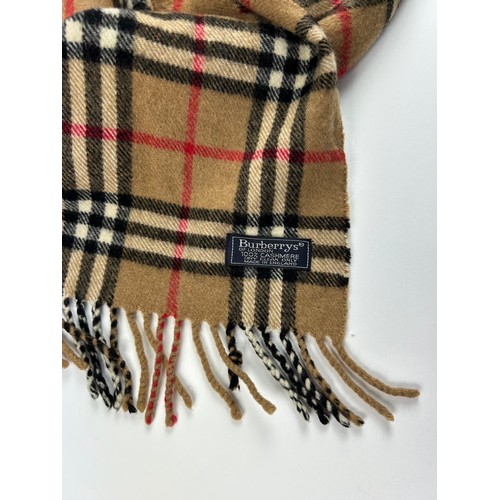 109 - A COLLECTION OF THREE BURBERRY WOOL SCARVES WITH NOVA CHECK PATTERN THROUGHOUT,