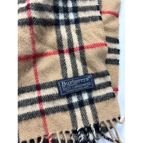 110 - A COLLECTION OF THREE BURBERRY WOOL SCARVES WITH NOVA CHECK PATTERN THROUGHOUT,