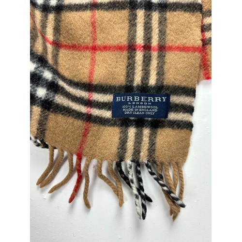 110 - A COLLECTION OF THREE BURBERRY WOOL SCARVES WITH NOVA CHECK PATTERN THROUGHOUT,