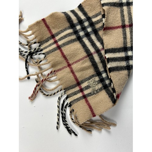 111 - A COLLECTION OF THREE BURBERRY WOOL SCARVES WITH NOVA CHECK PATTERN THROUGHOUT,