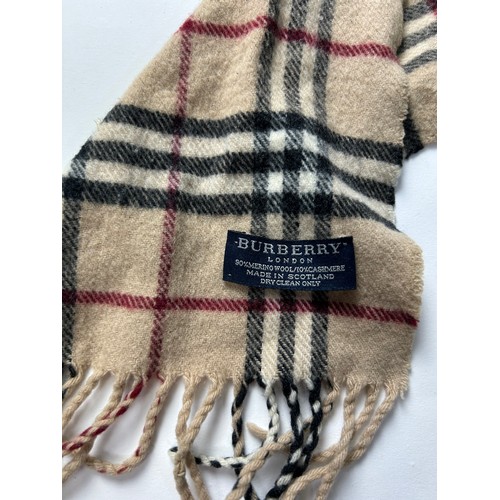 111 - A COLLECTION OF THREE BURBERRY WOOL SCARVES WITH NOVA CHECK PATTERN THROUGHOUT,