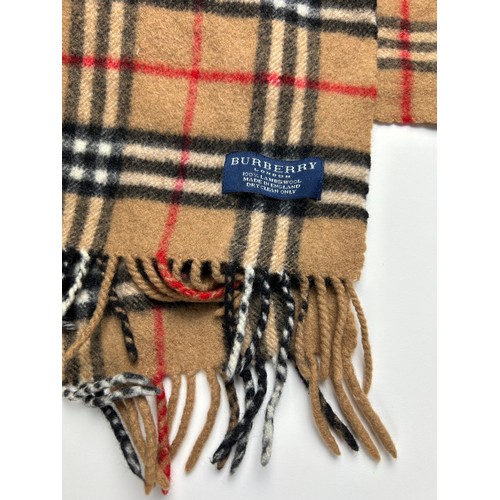 111 - A COLLECTION OF THREE BURBERRY WOOL SCARVES WITH NOVA CHECK PATTERN THROUGHOUT,